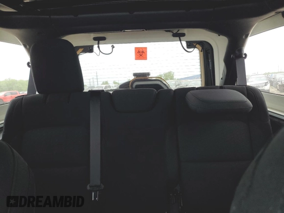 2023 Jeep Wrangler Sahara with VIN 1C4HJXEG6PW577427, listed as a Copart auction lot 57229185 with Not provided miles and Non repairable. Bid and sale history available at DreamBid. Image 10.