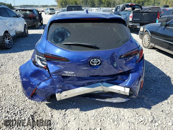 2024 Toyota Corolla Hatchback SE with VIN JTND4MBE3R3230872, listed as a Copart auction lot 76112324 with 6,882 mi miles and Salvage Title. Bid and sale history available at carsss.com. Image 6.