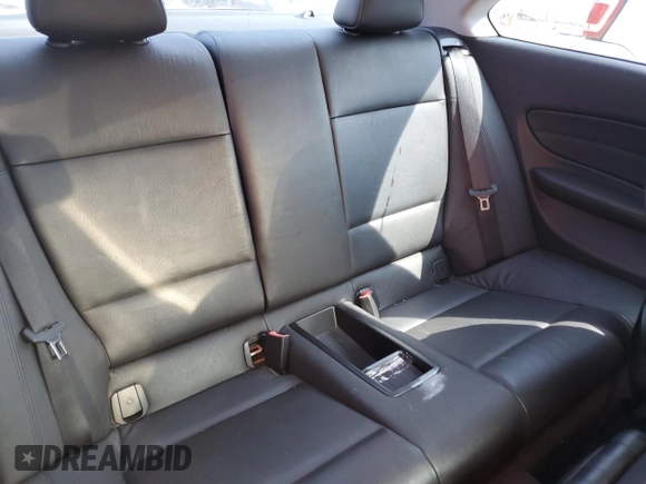 2011 BMW 1 Series 128i with VIN WBAUP9C55BVL89682, listed as a Copart auction lot 59177385 with 131,327 mi miles and Salvage title. Bid and sale history available at DreamBid. Image 10.