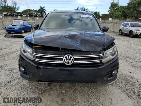 2014 Volkswagen Tiguan SE with VIN WVGAV3AXXEW543245, listed as a Copart auction lot 42288905 with 92,851 mi miles and Salvage title. Bid and sale history available at DreamBid. Image 5.
