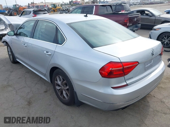 2016 Volkswagen Passat S with VIN 1VWAT7A32GC053916, listed as a IAAI auction lot 42288513 with 145,882 mi miles and . Bid and sale history available at DreamBid. Image 3.