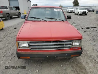 1988 GMC Sonoma with VIN 1GTBS14E2J2539806, listed as a Copart auction lot 71105184 with 141,085 mi miles and Salvage Title. Bid and sale history available at DreamBid. Image 5.