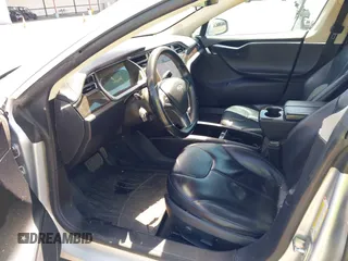 2013 Tesla Model S with VIN 5YJSA1CN5DFP11381, listed as a IAAI auction lot 42087803 with 146,818 mi miles and . Bid and sale history available at DreamBid. Image 5.
