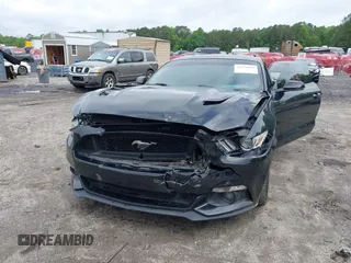2015 Ford Mustang GT with VIN 1FA6P8CF2F5423037, listed as a IAAI auction lot 42370882 with 149,794 mi miles and . Bid and sale history available at DreamBid. Image 6.