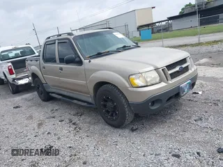 2004 Ford Explorer Sport Trac XLS z VIN 1FMZU67K04UA43558, wystawiony jako IAAI lot #42124644 z przebiegiem 270 550 mil mil oraz . Historia ofert i sprzedaży dostępna na DreamBid. Obrazek 1.