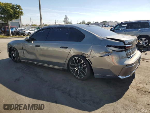 2024 BMW 7 Series 740i xDrive with VIN WBA33EH08RCR40142, listed as a Copart auction lot 87802195 with 6,409 mi miles and Salvage Title. Bid and sale history available at carsss.com. Image 2.