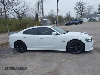 2019 Dodge Charger Scat Pack with VIN 2C3CDXGJXKH635612, listed as a IAAI auction lot 42010995 with 34,860 mi miles and . Bid and sale history available at DreamBid. Image 13.