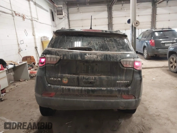 2021 Jeep Compass Sport with VIN 3C4NJDAB2MT584484, listed as a IAAI auction lot 41337382 with 96,940 mi miles and . Bid and sale history available at DreamBid. Image 16.