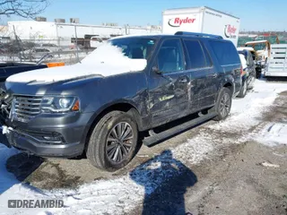 2015 Lincoln Navigator L with VIN 5LMJJ3JT3FEJ13389, listed as a IAAI auction lot 41205754 with 117,883 mi miles. Bid and sale history available at carsss.com. Image 2.