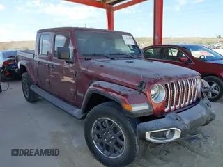 2021 Jeep Gladiator Overland z VIN 1C6HJTFGXML553983, wystawiony jako IAAI lot #41903068 z przebiegiem 54 386 mil mil oraz . Historia ofert i sprzedaży dostępna na DreamBid. Obrazek 1.