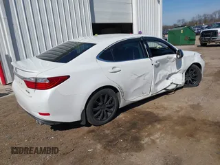 2013 Lexus ES 4dr Sdn with VIN JTHBK1GG7D2020623, listed as a IAAI auction lot 41791225 with 106,708 mi miles. Bid and sale history available at carsss.com. Image 4.