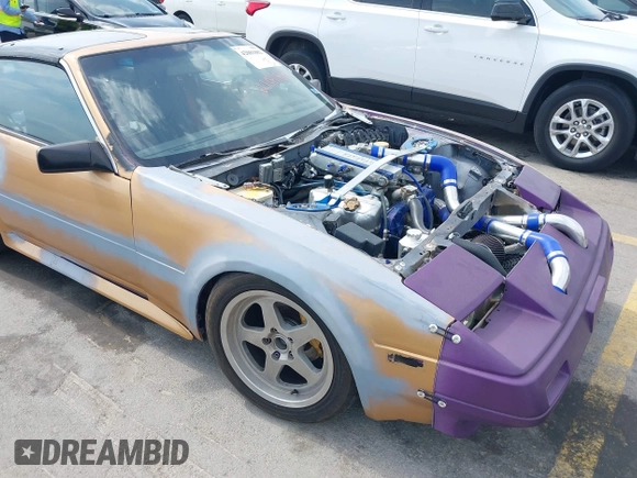 1986 Nissan 300ZX z VIN JN1HZ14S8GX144992, wystawiony jako IAAI lot #42081882 z przebiegiem 127 316 mil mil oraz . Historia ofert i sprzedaży dostępna na DreamBid. Obrazek 6.