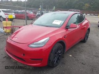 2023 Tesla Model Y Long Range with VIN 7SAYGAEE5PF685474, listed as a IAAI auction lot 40348773 with 26,605 mi miles and . Bid and sale history available at DreamBid. Image 19.