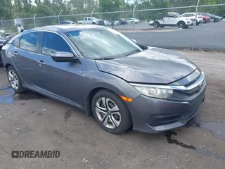 2017 Honda Civic LX with VIN 19XFC2F52HE059618, listed as a IAAI auction lot 42634251 with 136,492 mi miles and . Bid and sale history available at DreamBid. Image 1.