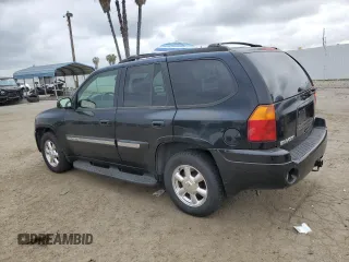 2004 GMC Envoy SLE with VIN 1GKDT13S442155788, listed as a Copart auction lot 50270135 with 164,271 mi miles and Salvage Title. Bid and sale history available at carsss.com. Image 2.