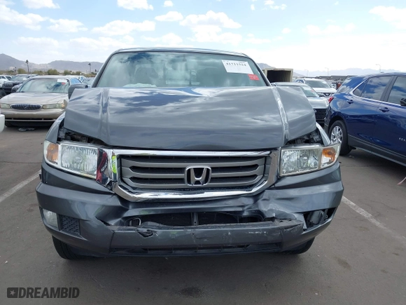 2013 Honda Ridgeline RTS with VIN 5FPYK1F4XDB016430, listed as a IAAI auction lot 41711524 with 132,185 mi miles. Bid and sale history available at carsss.com. Image 12.