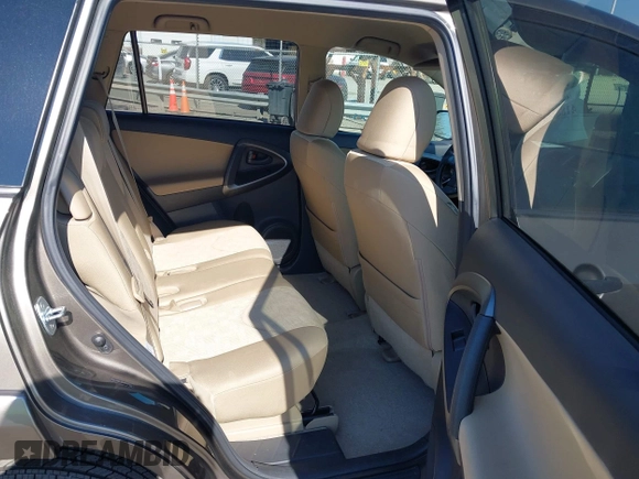 2009 Toyota RAV4 with VIN JTMZF33V395009905, listed as a IAAI auction lot 41881121 with 117,584 mi miles. Bid and sale history available at carsss.com. Image 8.