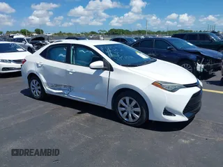 2017 Toyota Corolla L with VIN 5YFBURHE7HP570516, listed as a IAAI auction lot 42518762 with 76,776 mi miles and . Bid and sale history available at DreamBid. Image 1.