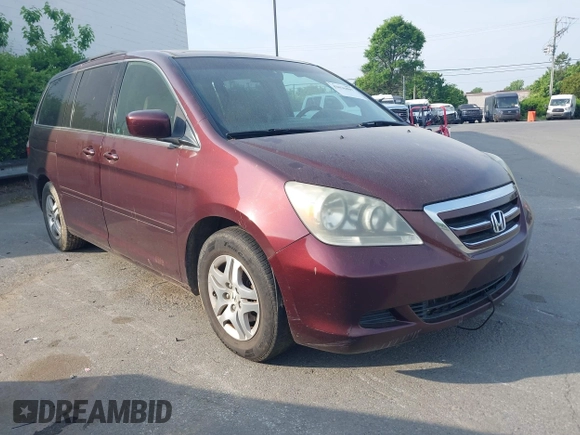 2007 Honda Odyssey EX-L with VIN 5FNRL387X7B140635, listed as a IAAI auction lot 42036807 with 292,774 mi miles. Bid and sale history available at carsss.com. Image 1.
