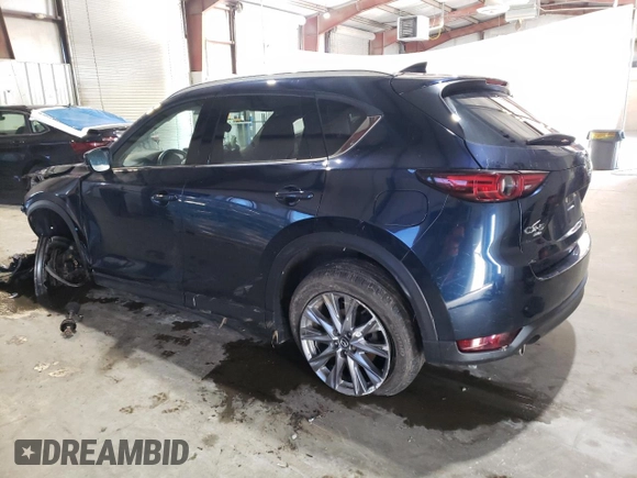2021 Mazda CX-5 Grand Touring with VIN JM3KFBDM3M0327635, listed as a Copart auction lot 49980635 with 47,160 mi miles and Salvage Title. Bid and sale history available at carsss.com. Image 2.
