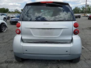 2009 Smart fortwo Pure with VIN WMEEJ31X89K251402, listed as a Copart auction lot 56791545 with 52,636 mi miles and Clean title. Bid and sale history available at DreamBid. Image 10.