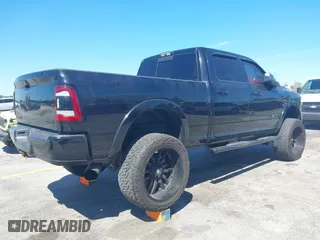 2019 Ram 2500 Laramie with VIN 3C6UR5FLXKG710325, listed as a IAAI auction lot 41853777 with 104,286 mi miles. Bid and sale history available at carsss.com. Image 4.