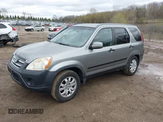 2005 Honda CR-V EX with VIN JHLRD78855C060637, listed as a IAAI auction lot 42079014 with 170,060 mi miles. Bid and sale history available at carsss.com. Image 2.