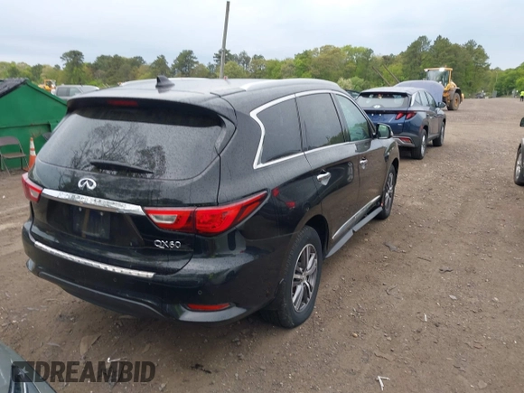 2017 Infiniti QX60 with VIN 5N1DL0MM6HC503852, listed as a IAAI auction lot 42236879 with 159,563 mi miles and . Bid and sale history available at DreamBid. Image 4.