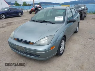 2003 Ford Focus SE z VIN 1FAFP34PX3W135265, wystawiony jako IAAI lot #42354012 z przebiegiem 79 617 mil mil oraz . Historia ofert i sprzedaży dostępna na DreamBid. Obrazek 6.