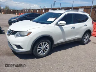 2016 Nissan Rogue SV with VIN KNMAT2MV0GP670288, listed as a IAAI auction lot 42202645 with 211,454 mi miles. Bid and sale history available at carsss.com. Image 17.