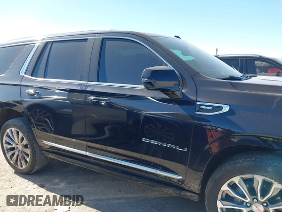 2021 GMC Yukon Denali with VIN 1GKS2DKL1MR135771, listed as a IAAI auction lot 41403680 with 61,772 mi miles. Bid and sale history available at carsss.com. Image 13.