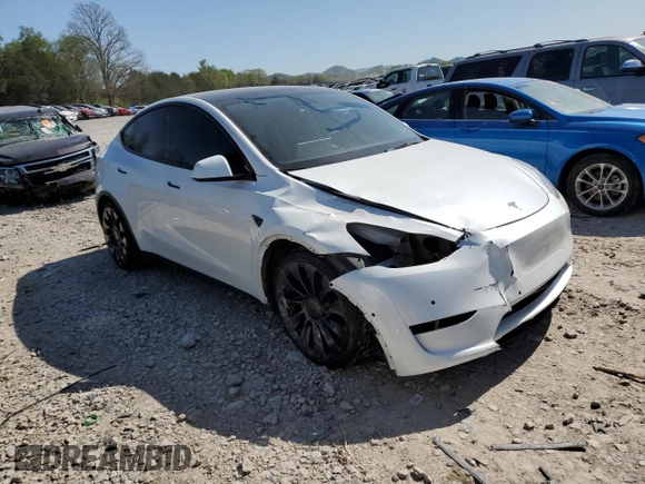 2021 Tesla Model Y Performance with VIN 5YJYGDEF7MF269221, listed as a Copart auction lot 52109785 with 61,619 mi miles and Salvage Title. Bid and sale history available at DreamBid. Image 4.