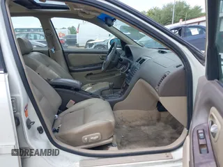 2002 Nissan Maxima GLE z VIN JN1DA31AX2T313083, wystawiony jako IAAI lot #42040751 z przebiegiem 182 814 mil mil oraz . Historia ofert i sprzedaży dostępna na DreamBid. Obrazek 5.