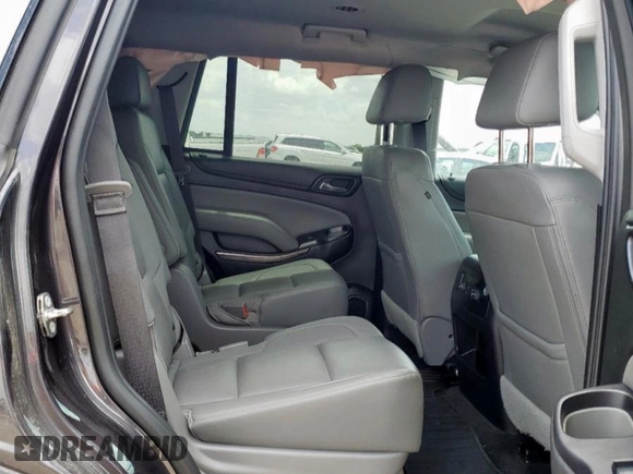 2018 Chevrolet Tahoe LT with VIN 1GNSCBKC8JR135511, listed as a Copart auction lot 60357095 with 123,904 mi miles and Salvage title. Bid and sale history available at DreamBid. Image 11.