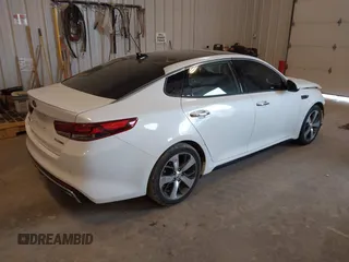 2018 Kia Optima SX with VIN 5XXGW4L27JG237960, listed as a IAAI auction lot 41956461 with 87,085 mi miles and . Bid and sale history available at DreamBid. Image 4.