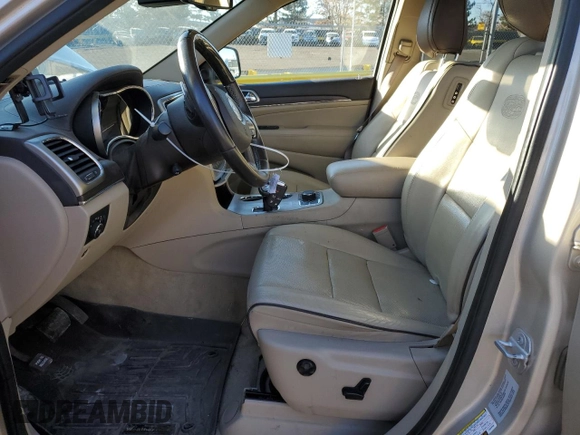 2015 Jeep Grand Cherokee High Altitude with VIN 1C4RJFCM6FC878769, listed as a Copart auction lot 46704755 with 81,727 mi miles and Salvage title. Bid and sale history available at DreamBid. Image 7.