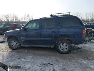 2003 Chevrolet Tahoe LT with VIN 1GNEC13Z63R182212, listed as a IAAI auction lot 41399286 with 241,980 mi miles. Bid and sale history available at carsss.com. Image 14.