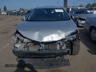 2019 Toyota Corolla L with VIN 2T1BURHE2KC190975, listed as a IAAI auction lot 41901370 with 94,925 mi miles. Bid and sale history available at carsss.com. Image 13.