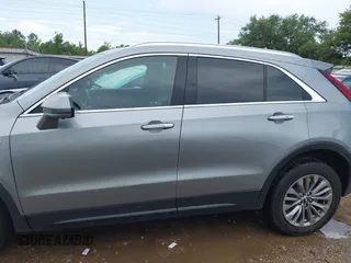 2025 Cadillac XT4 FWD Premium Luxury z VIN 1GYFZCR44SF122443, wystawiony jako IAAI lot #42414279 z przebiegiem 11 023 mil mil oraz . Historia ofert i sprzedaży dostępna na DreamBid. Obrazek 14.