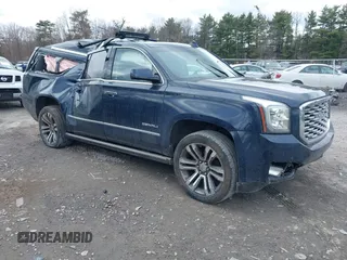 2020 GMC Yukon XL Denali with VIN 1GKS2HKJ3LR177072, listed as a IAAI auction lot 41879461 with 102,971 mi miles. Bid and sale history available at carsss.com. Image 1.