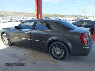 2010 Chrysler 300 Touring with VIN 2C3CA5CV5AH233033, listed as a IAAI auction lot 42130676 with 158,323 mi miles and . Bid and sale history available at DreamBid. Image 14.