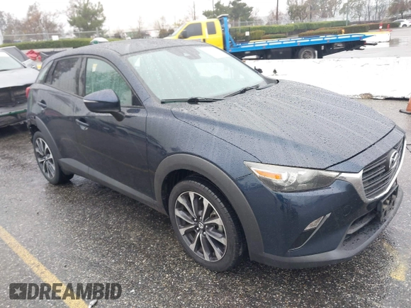 2019 Mazda CX-3 Touring with VIN JM1DKDC79K0424436, listed as a IAAI auction lot 41579280 with 76,989 mi miles. Bid and sale history available at carsss.com. Image 1.