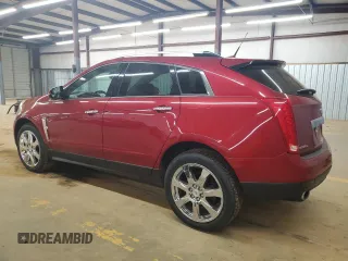 2011 Cadillac SRX Performance Collection with VIN 3GYFNEEY2BS517233, listed as a Copart auction lot 53602475 with 124,880 mi miles and Salvage Title. Bid and sale history available at carsss.com. Image 2.