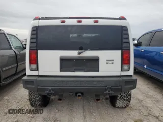 2005 Hummer H2 SUV with VIN 5GRGN23UX5H116341, listed as a Copart auction lot 76877704 with 145,778 mi miles and Salvage Title. Bid and sale history available at carsss.com. Image 6.
