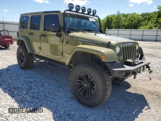 2013 Jeep Wrangler Unlimited Rubicon with VIN 1C4BJWFG0DL587057, listed as a Copart auction lot 57362535 with 102,684 mi miles and Salvage title. Bid and sale history available at DreamBid. Image 4.
