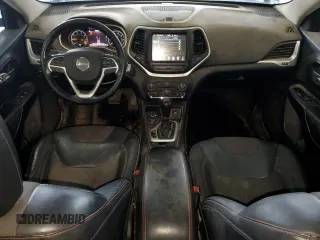 2014 Jeep Cherokee Trailhawk z VIN 1C4PJMBB0EW309277, wystawiony jako Copart lot #52370565 z przebiegiem 148 924 mil mil oraz Czysty tytuł • Clean title. Historia ofert i sprzedaży dostępna na DreamBid. Obrazek 8.