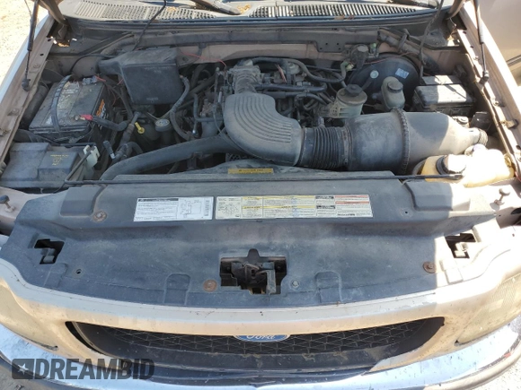 1997 Ford F-150 XL z VIN 1FTEX17LXVNB11737, wystawiony jako Copart lot #52624175 z przebiegiem 94 897 mil mil oraz Szkoda całkowita • Salvage title. Historia ofert i sprzedaży dostępna na DreamBid. Obrazek 11.