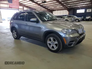 2012 BMW X5 35d with VIN 5UXZW0C51CL666413, listed as a Copart auction lot 54561955 with 155,762 mi miles and Clean title. Bid and sale history available at DreamBid. Image 4.