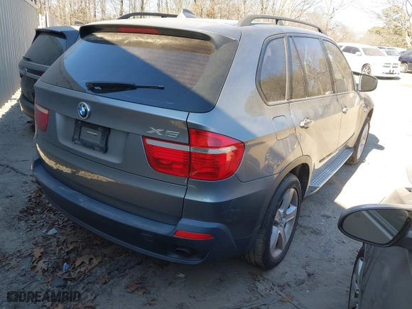 2007 BMW X5 3.0si with VIN 5UXFE43517LY81390, listed as a IAAI auction lot 41671651 with 157,652 mi miles. Bid and sale history available at carsss.com. Image 4.