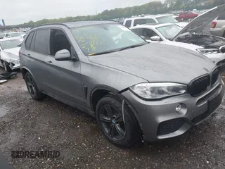 2014 BMW X5 xDrive35i z VIN 5UXKR0C5XE0K52057, wystawiony jako IAAI lot #42368832 z przebiegiem 98 548 mil mil oraz . Historia ofert i sprzedaży dostępna na DreamBid. Obrazek 1.